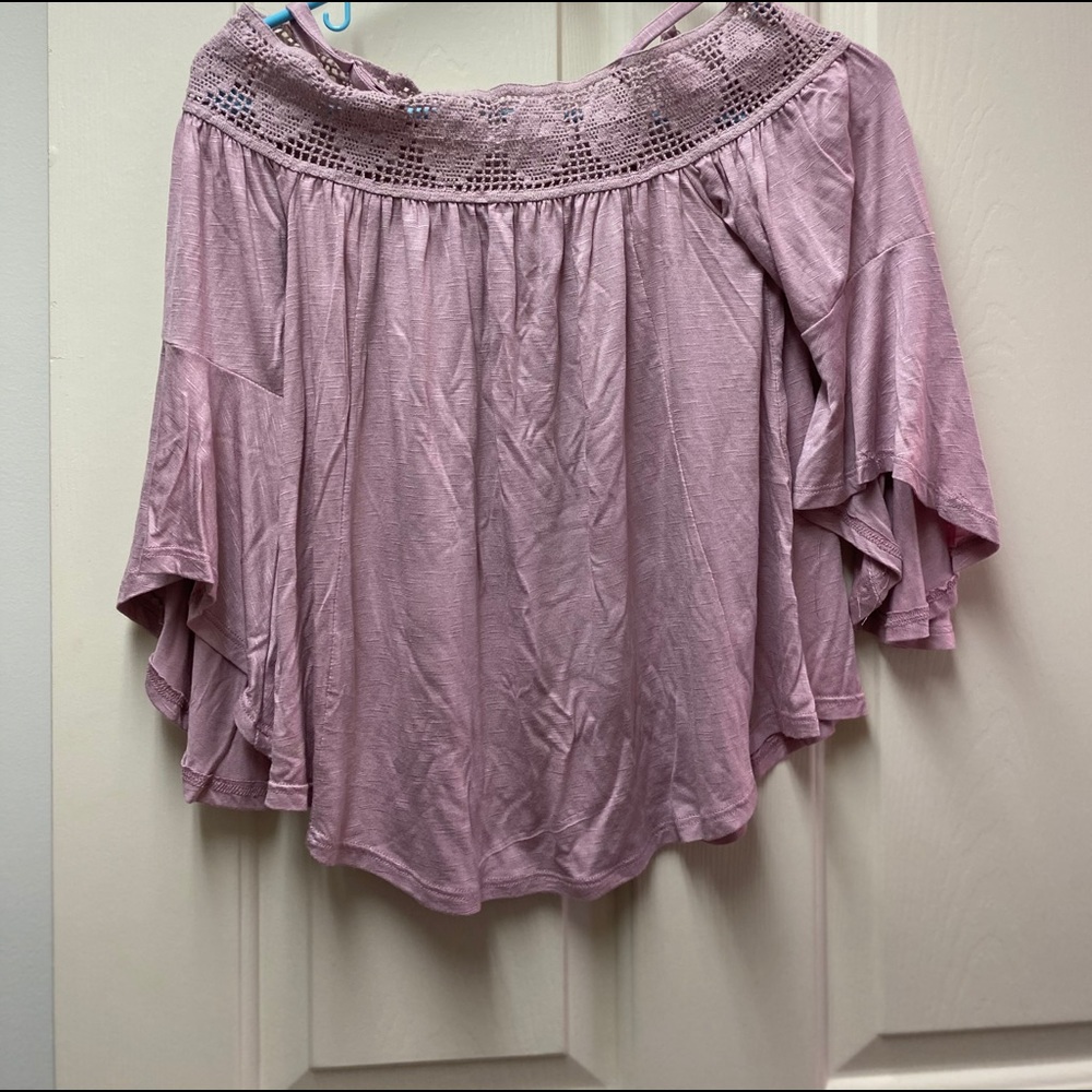 Off the sloughed blouse never worn